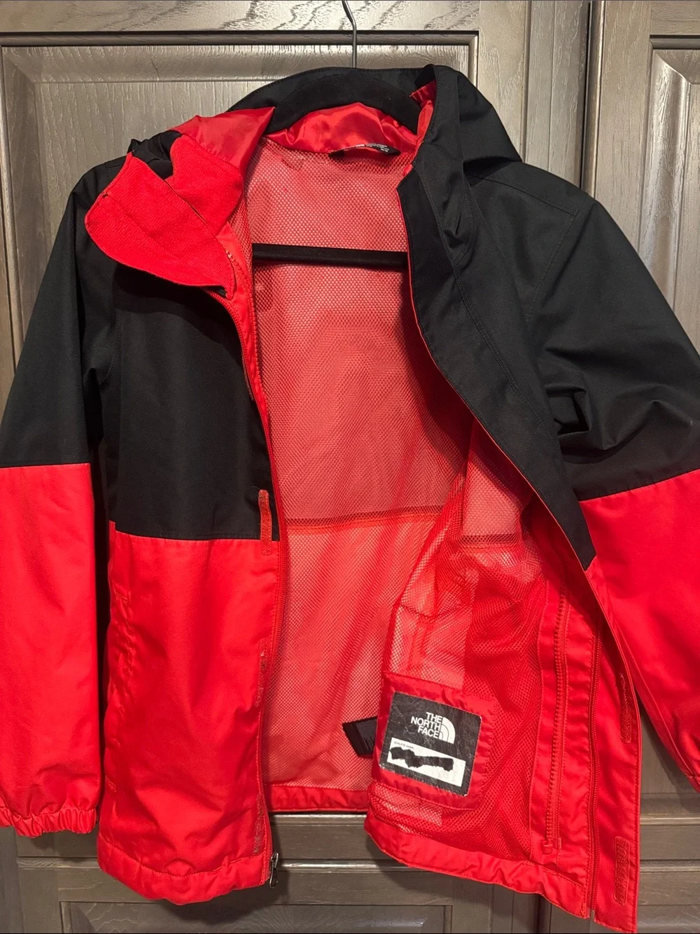 The North Face Kids Black and Red Raincoat with Hood